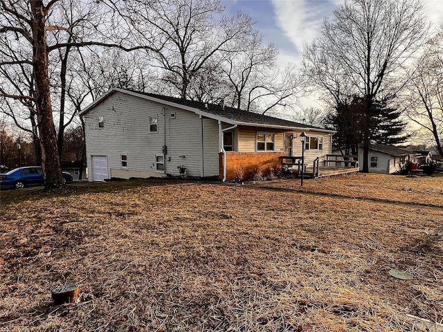 1505 Shelley Dr, Vandalia, IL 62471 - rear view of house with a garage