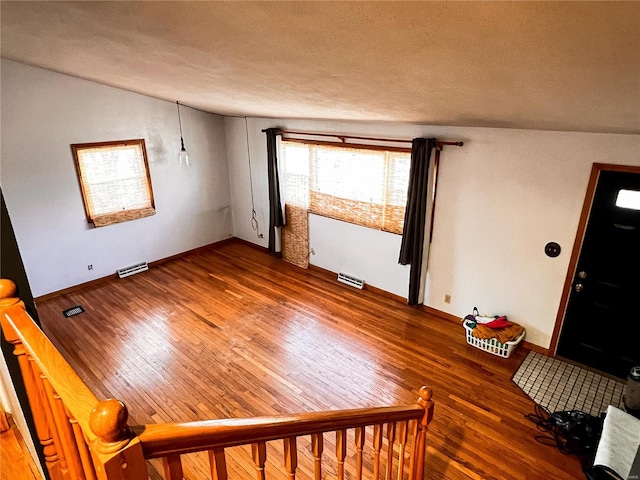 1505 Shelley Dr, Vandalia, IL 62471 - foyer with wood finished floors, baseboards, and a textured ceiling