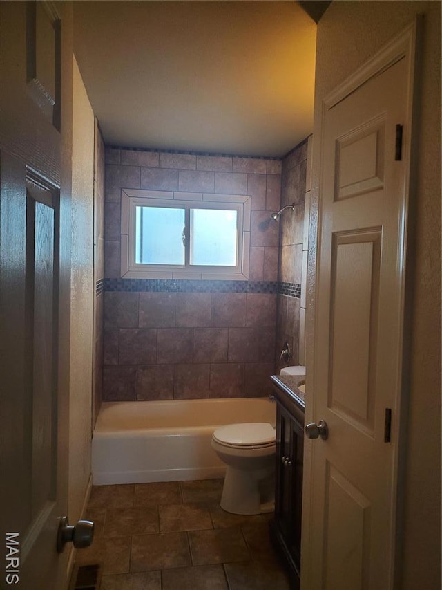 20 Leonard Dr, Cahokia, IL 62206 - full bathroom with toilet, tile patterned floors, vanity, and  shower combination