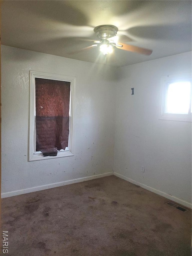 20 Leonard Dr, Cahokia, IL 62206 - carpeted spare room with ceiling fan and baseboards