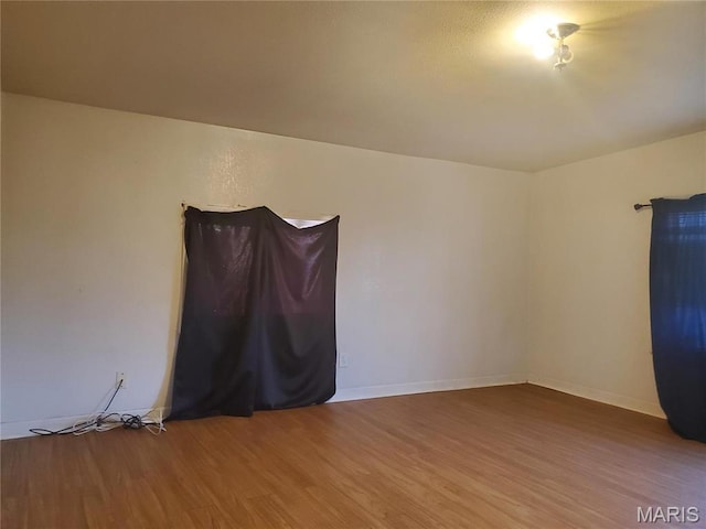 20 Leonard Dr, Cahokia, IL 62206 - empty room with wood finished floors and baseboards