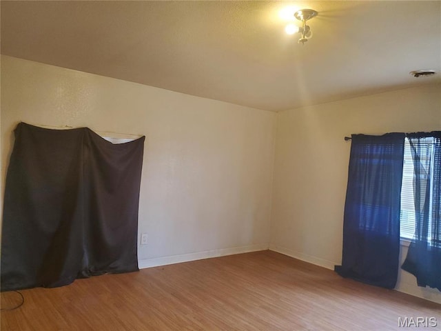 20 Leonard Dr, Cahokia, IL 62206 - unfurnished room featuring wood finished floors and baseboards