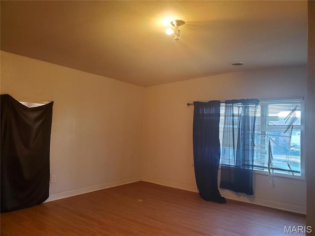 20 Leonard Dr, Cahokia, IL 62206 - unfurnished room with wood finished floors and baseboards