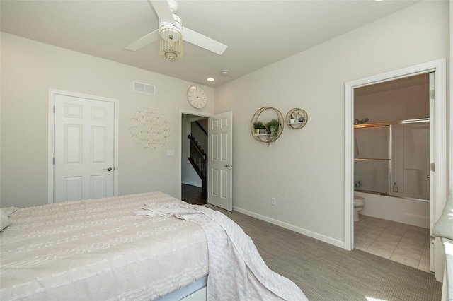 237 Mason Glen Dr, Lake St Louis, MO 63367 - carpeted bedroom with baseboards, ensuite bathroom, ceiling fan, and tile patterned flooring