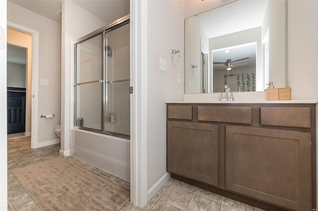 237 Mason Glen Dr, Lake St Louis, MO 63367 - full bath featuring tile patterned flooring, baseboards, vanity, toilet, and a ceiling fan
