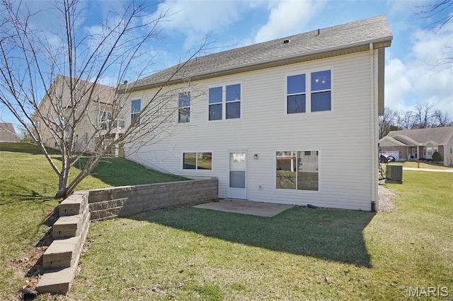 304 Spotted Fawn, Wentzville, MO 63385 - back of property featuring a yard, a patio area, and cooling unit