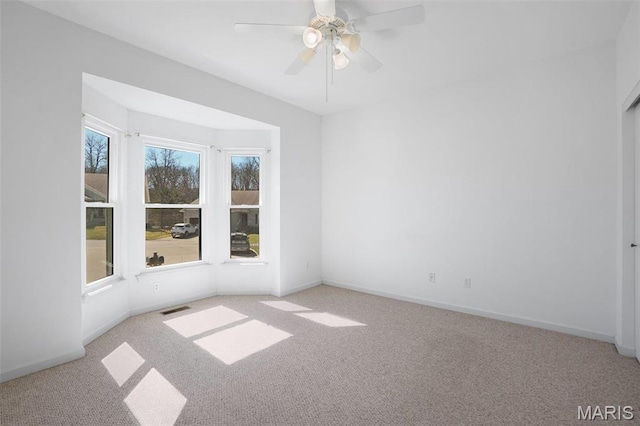 304 Spotted Fawn, Wentzville, MO 63385 - carpeted spare room featuring a ceiling fan and baseboards