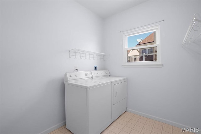 304 Spotted Fawn, Wentzville, MO 63385 - laundry room with washing machine and dryer and baseboards