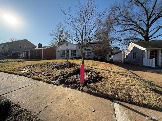 8510 Eulalie Ave, Saint Louis, MO 63144 - view of front of home with a residential view and a detached garage