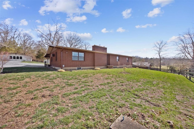12044 State Route A, Saint Genevieve, MO 63670 - view of property exterior with a chimney and brick siding