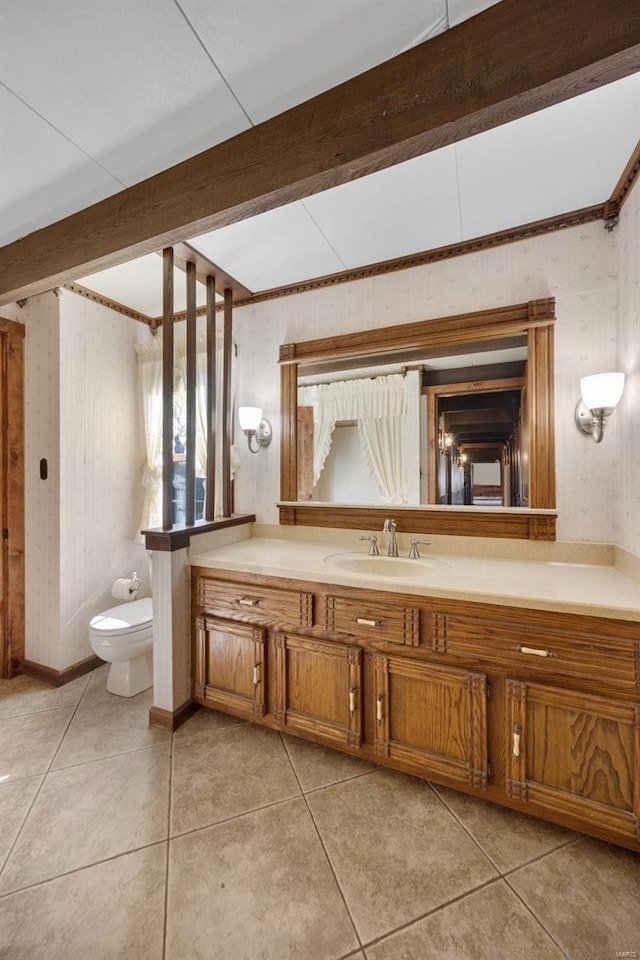 12044 State Route A, Saint Genevieve, MO 63670 - bathroom featuring beam ceiling, toilet, vanity, and tile patterned floors