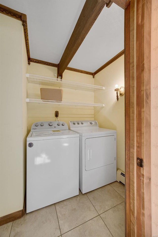 12044 State Route A, Saint Genevieve, MO 63670 - washroom with independent washer and dryer, a baseboard heating unit, light tile patterned flooring, and crown molding
