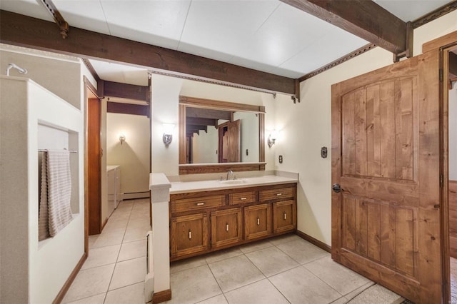 12044 State Route A, Saint Genevieve, MO 63670 - bathroom with tile patterned flooring, beam ceiling, a baseboard heating unit, and vanity