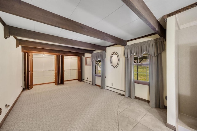 12044 State Route A, Saint Genevieve, MO 63670 - unfurnished living room featuring a baseboard heating unit, baseboards, beam ceiling, and light carpet