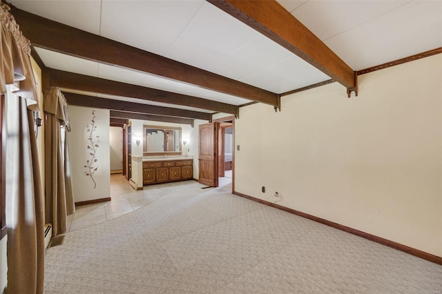 12044 State Route A, Saint Genevieve, MO 63670 - unfurnished bedroom featuring light colored carpet, baseboards, beamed ceiling, a baseboard heating unit, and light tile patterned floors