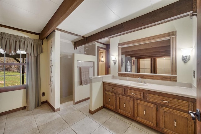 12044 State Route A, Saint Genevieve, MO 63670 - bathroom featuring beam ceiling, vanity, baseboards, walk in shower, and tile patterned flooring