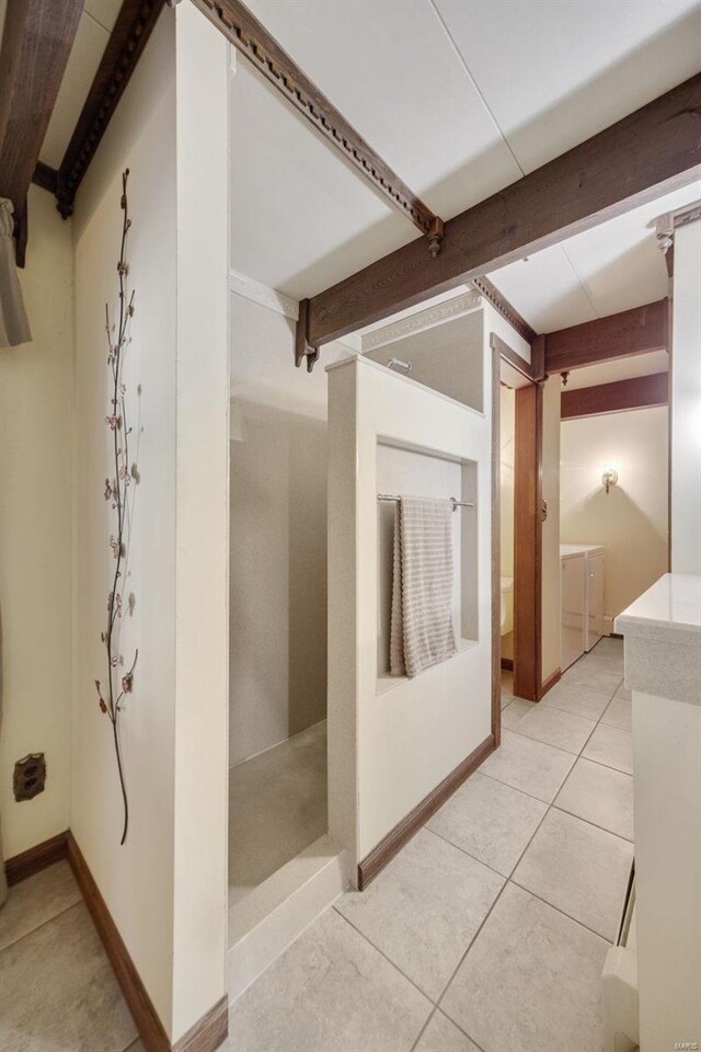12044 State Route A, Saint Genevieve, MO 63670 - corridor with tile patterned floors, beam ceiling, and baseboards
