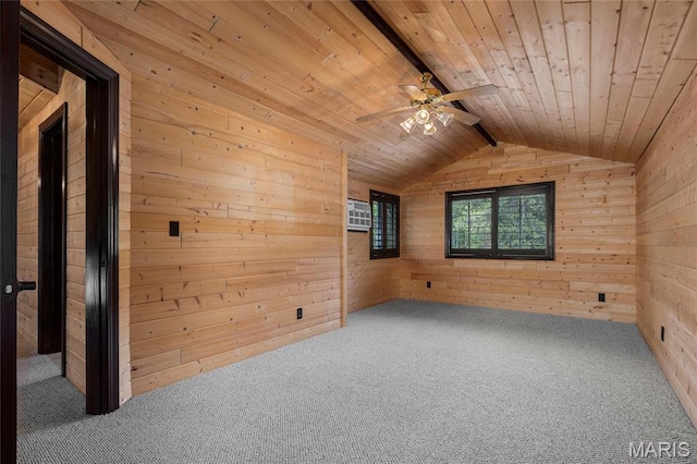 empty room with wooden ceiling, wooden walls, carpet floors, lofted ceiling, and a ceiling fan