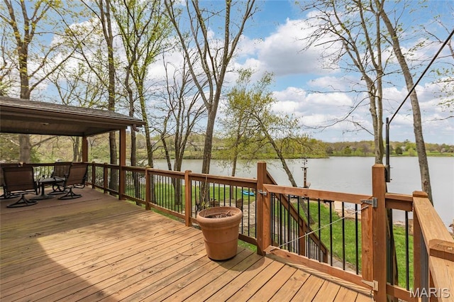 deck featuring a water view