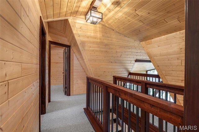 803 S Aspen Point Dr, Innsbrook, MO 63390 - hallway with wood ceiling, lofted ceiling, wood walls, and carpet