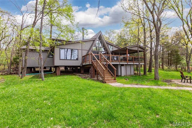 803 S Aspen Point Dr, Innsbrook, MO 63390 - rear view of property featuring a deck, stairway, and a yard