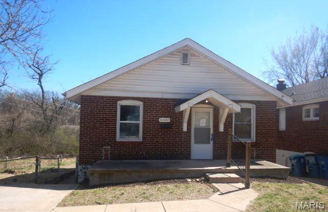 8380 College Ave, Saint Louis, MO 63136 - bungalow-style house featuring brick siding