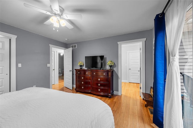 4650 Demaree St, House Springs, MO 63051 - bedroom with light wood-style flooring, ceiling fan, and baseboards