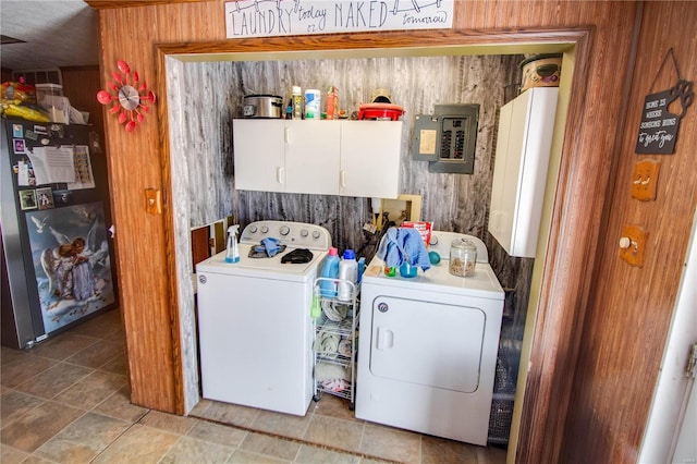 239 Olive St, Rockbridge, IL 62081 - laundry room with cabinet space, independent washer and dryer, electric panel, and wood walls