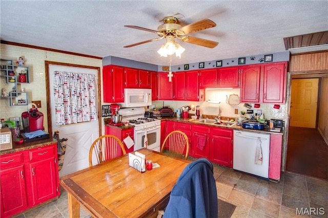 239 Olive St, Rockbridge, IL 62081 - kitchen featuring white appliances, a sink, ceiling fan, red cabinets, and a textured ceiling