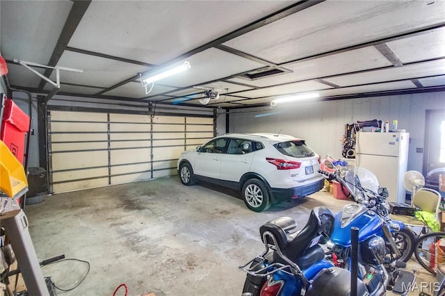 239 Olive St, Rockbridge, IL 62081 - garage with freestanding refrigerator