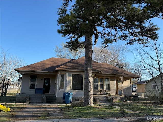 400 N Madison St, Malden, MO 63863 - bungalow with a porch and a shingled roof