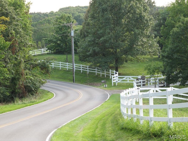 3921 Allenton Rd, Wildwood, MO 63069 - view of asphalt street featuring a wooded view