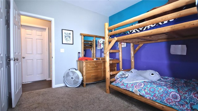 carpeted bedroom with baseboards