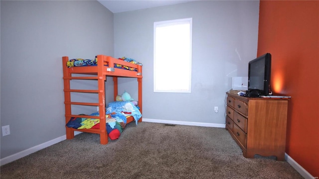 carpeted bedroom with baseboards