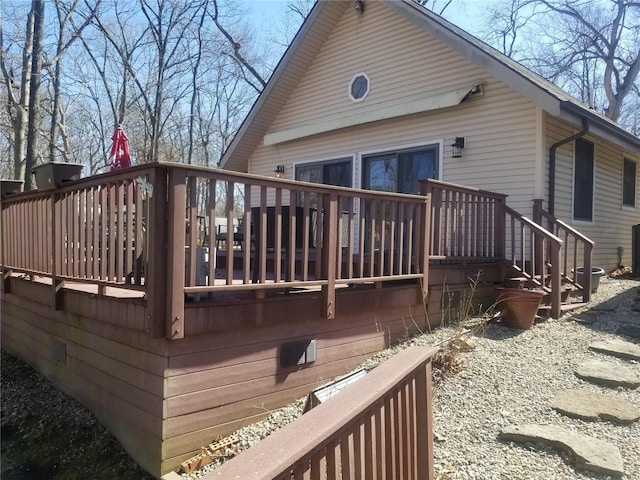 8774 E Chinquapin Ave E, Effingham, IL 62401 - rear view of house featuring a wooden deck and central AC unit