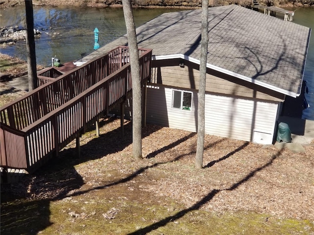 8774 E Chinquapin Ave E, Effingham, IL 62401 - exterior space with a deck with water view and stairs