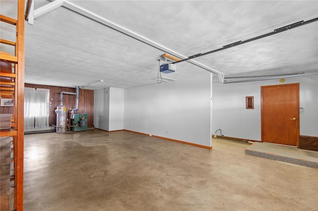 garage with water heater, baseboards, and a garage door opener
