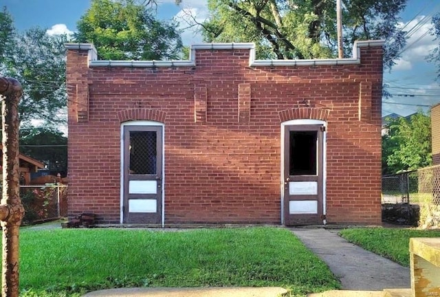 view of front of home with brick siding