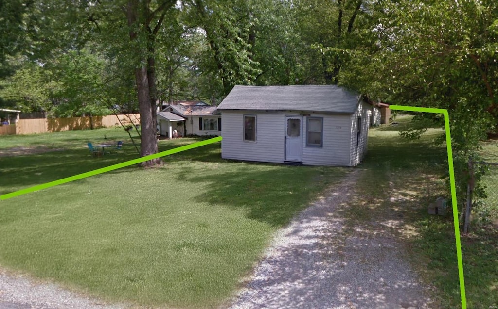 1336 2nd St, Cottage Hills, IL 62018 - view of yard with driveway and an outbuilding