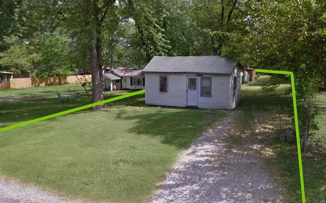 1336 2nd St, Cottage Hills, IL 62018 - view of yard with driveway and an outbuilding