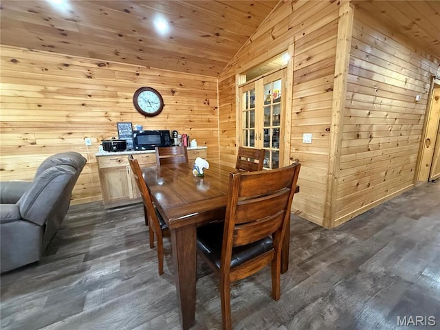 2887 County Road 5620, Willow Springs, MO 65789 - dining room featuring vaulted ceiling, wood walls, dark wood-type flooring, and wood ceiling