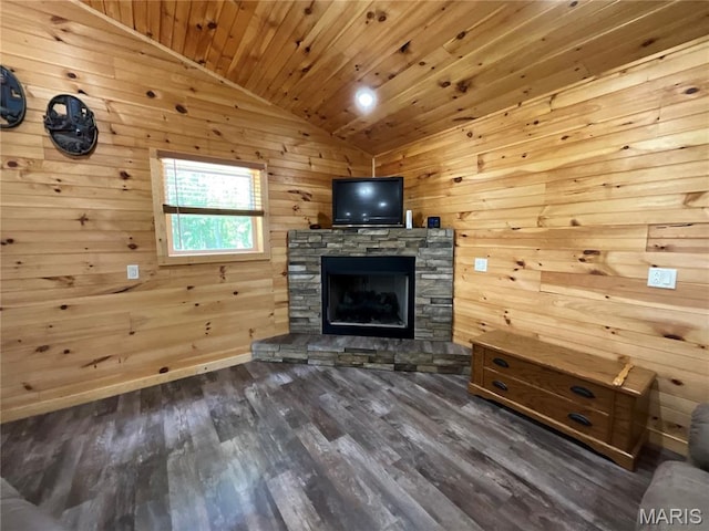 2887 County Road 5620, Willow Springs, MO 65789 - living area featuring vaulted ceiling, a fireplace, wooden walls, wood ceiling, and dark wood-type flooring