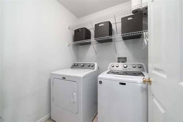 washroom featuring independent washer and dryer