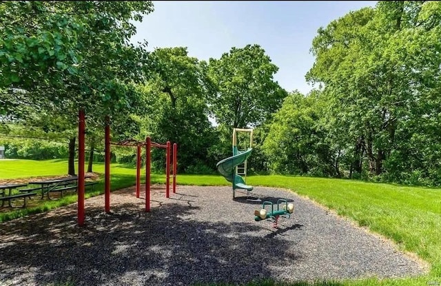 community playground featuring a yard