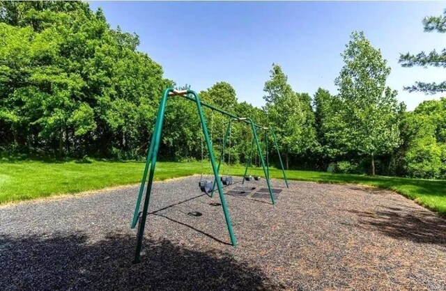 community play area with a yard