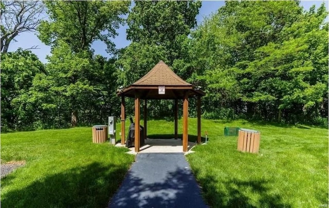view of home's community with a gazebo and a lawn