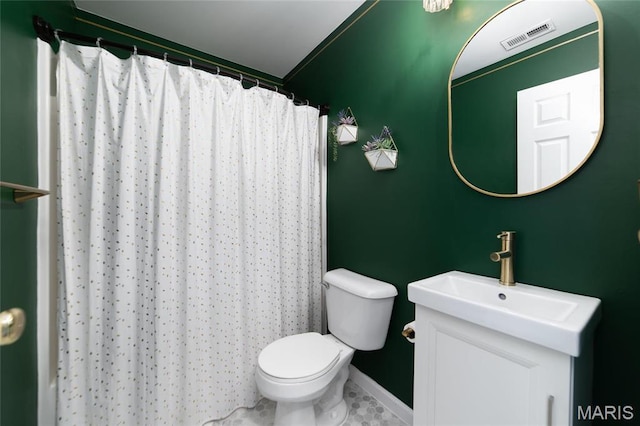 420 Benton Dr Unit I, Saint Peters, MO 63376 - bathroom with toilet, vanity, baseboards, and a shower with shower curtain