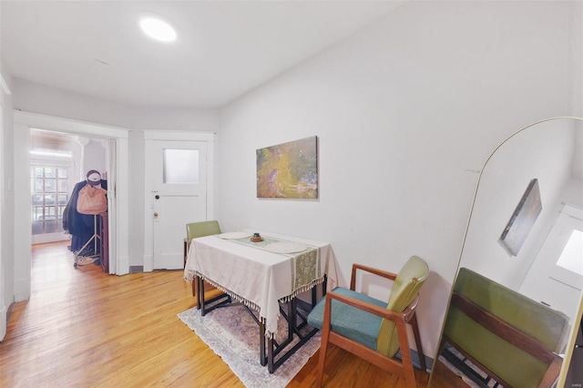 5044 Lindenwood Ave, Saint Louis, MO 63109 - dining room with light wood-type flooring and baseboards