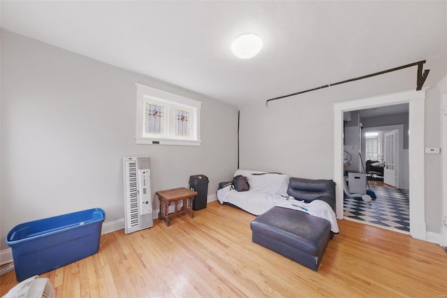 5044 Lindenwood Ave, Saint Louis, MO 63109 - bedroom featuring hardwood / wood-style flooring, multiple windows, and baseboards