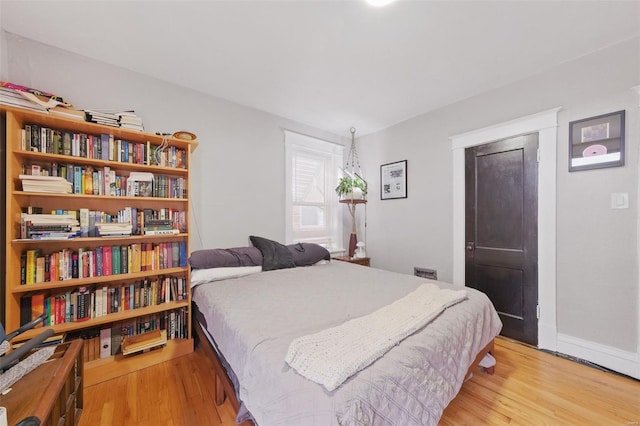 5044 Lindenwood Ave, Saint Louis, MO 63109 - bedroom featuring wood finished floors and baseboards